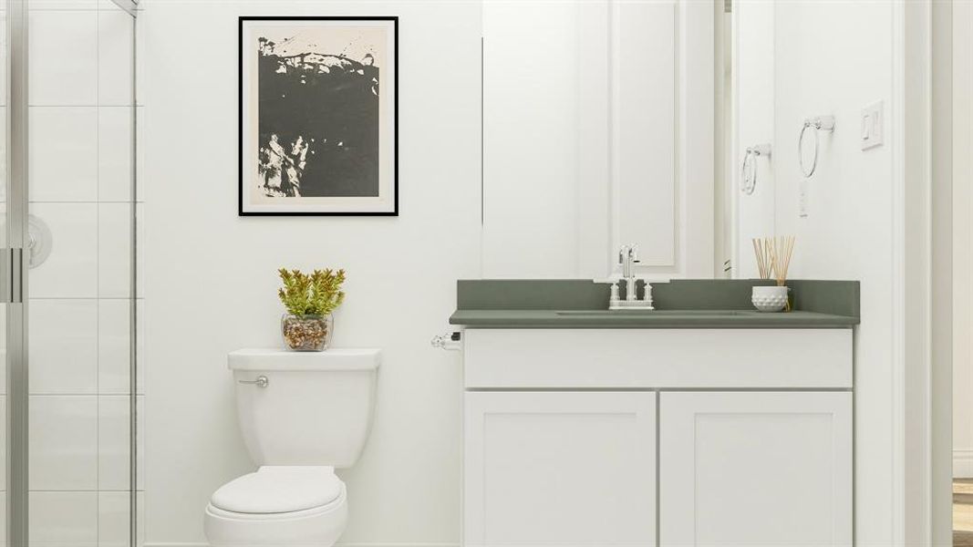 Bathroom featuring toilet and vanity