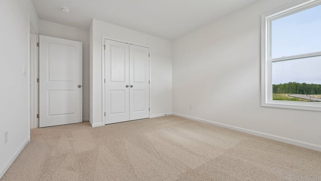 Spacious, unfurnished interior of a new home in The Estates Park, Apex (Image 29).