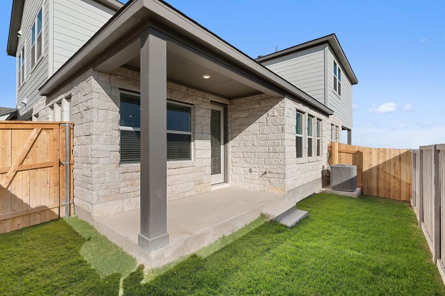 Exterior details and patio area of a home in Union Collection at Park Central, Georgetown (Image 26).