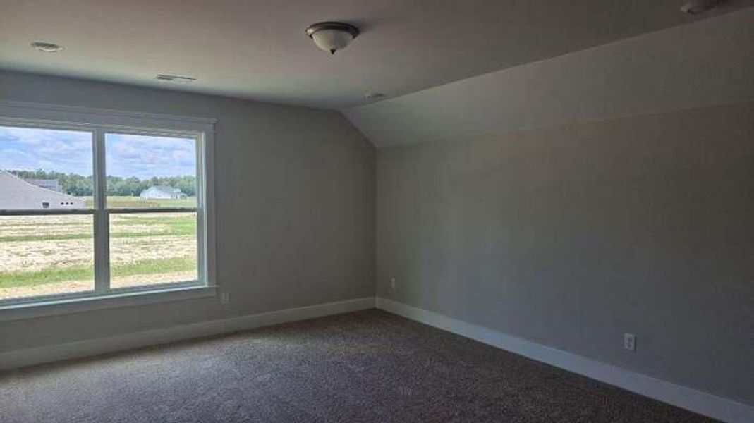 Spacious, unfurnished interior of a new home in The Enclave at French Quarter Creek, Huger (Image 16).