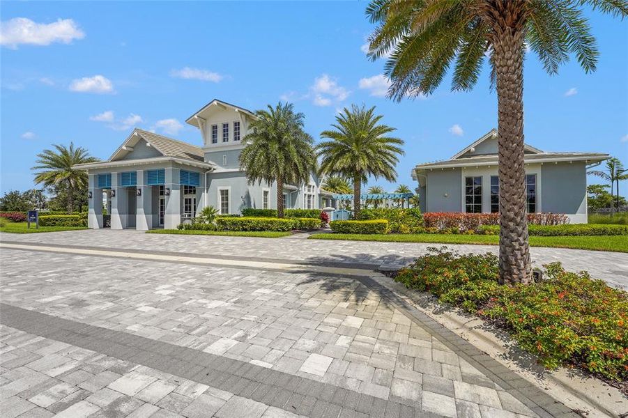 Front exterior of a new home in , Lakewood Ranch, FL, highlighting curb appeal (Image 24).