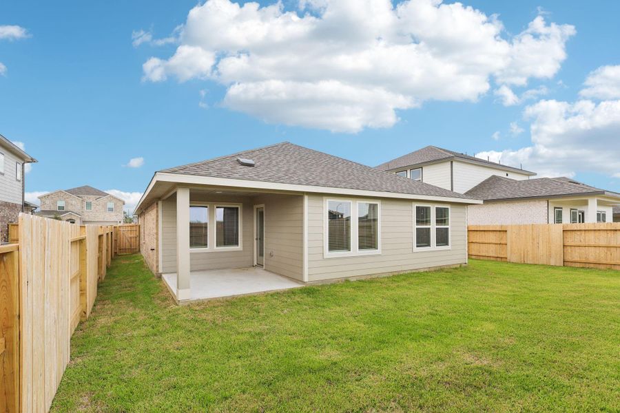 Front exterior of a new home in Heights of Barbers Hill, Mont Belvieu, TX, highlighting curb appeal (Image 2). Front exterior of a new home in Heights of Barbers Hill, Mont Belvieu, TX, highlighting curb appeal (Image 2).