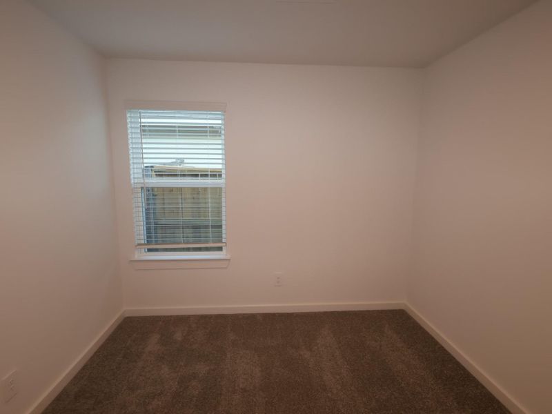 Spacious, unfurnished interior of a new home in Pinewood at Grand Texas, New Caney (Image 11).