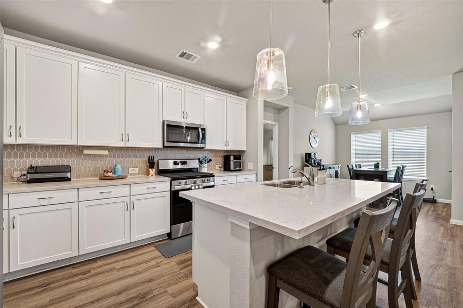 Furnished interior view inside a new home in Sweetgrass Village, Crosby (Image 7).