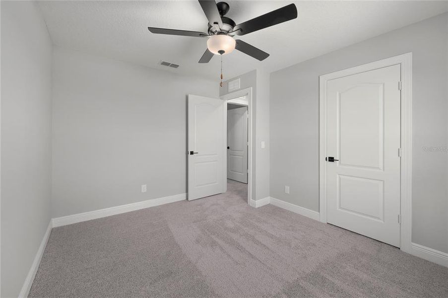 Spacious, unfurnished interior of a new home in Gum Lake Preserve, Lake Alfred (Image 35).