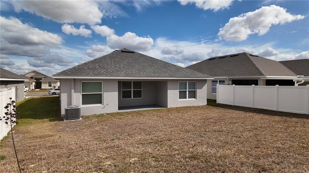 Exterior details and patio area of a home in Pine Bluff, Spring Hill (Image 3).