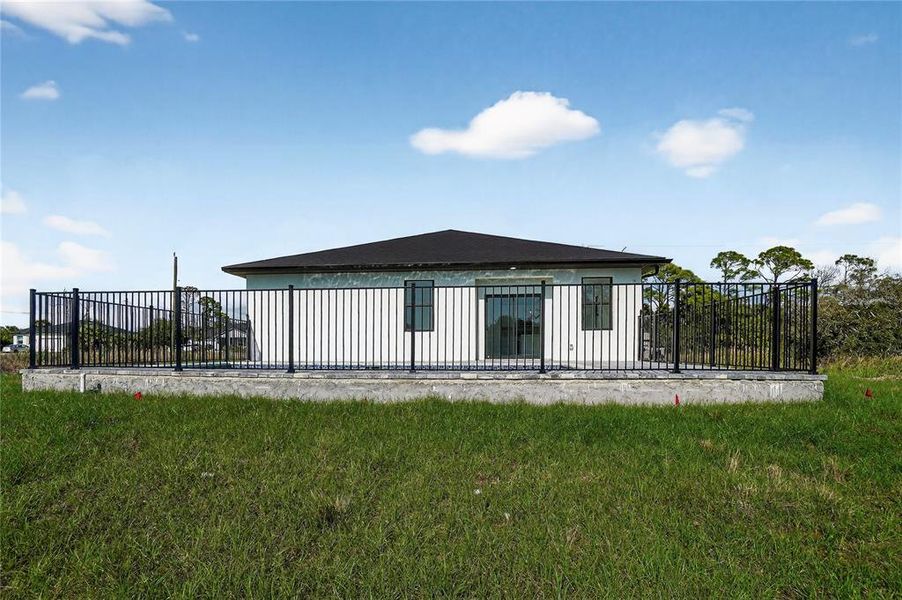 Exterior details and patio area of a home in , Rotonda West (Image 31).