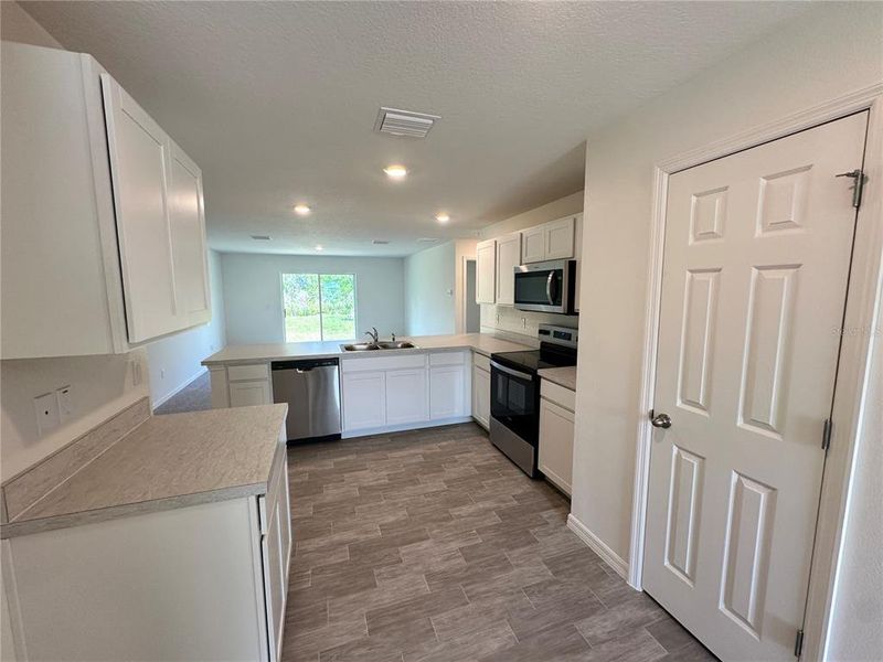 Furnished interior view inside a new home in Palm Coast, Palm Coast (Image 6). Furnished interior view inside a new home in Palm Coast, Palm Coast (Image 6).