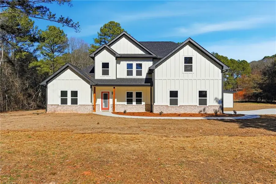 Front exterior of a new home in , Hampton, GA, highlighting curb appeal (Image 2). Front exterior of a new home in , Hampton, GA, highlighting curb appeal (Image 2).