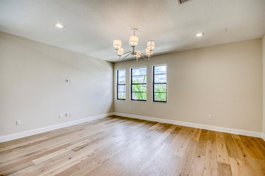 Furnished interior view inside a new home in Apex at Avenir, Palm Beach Gardens (Image 9).