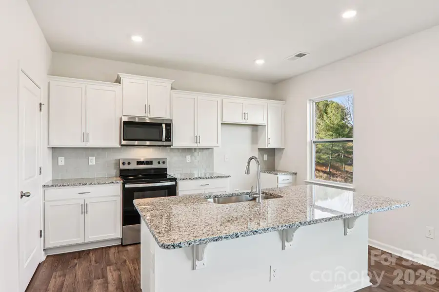 Furnished interior view inside a new home in Rydele Heights, Asheville (Image 6).