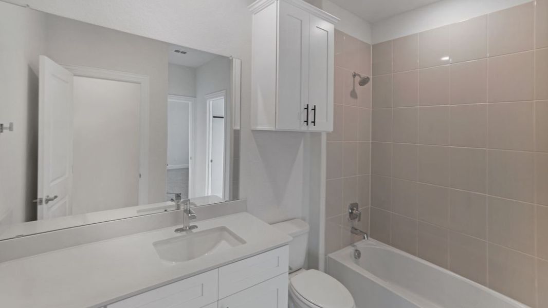 Representative furnished interior of a home built from the Appaloosa by D.R. Horton in The Avenue, Allen (Image 16).