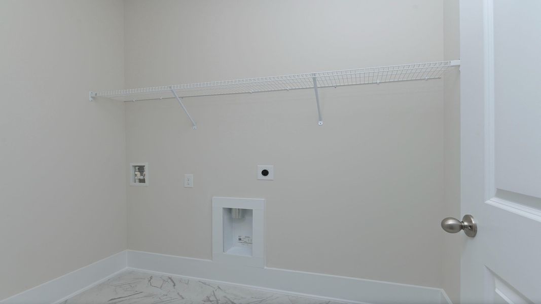 Representative unfurnished interior of a home built from the Litchfield by D.R. Horton in Lake Tide Summit, Chapin (Image 24).