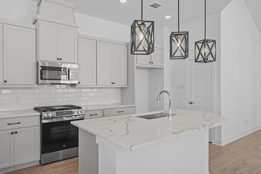 Furnished interior view inside a new home in Bridgeland Chateaus, Cypress (Image 6).