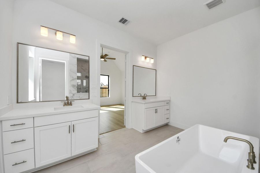 Furnished interior view inside a new home in ARTAVIA: Hilltop Collection, Conroe (Image 7).