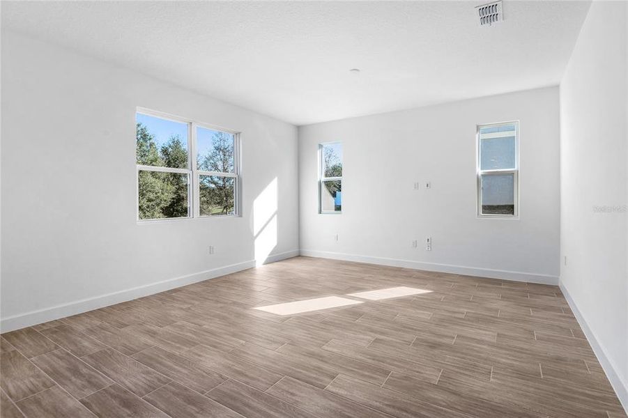 Spacious, unfurnished interior of a new home in Seasons at Wekiva Ridge, Mount Dora (Image 13). Spacious, unfurnished interior of a new home in Seasons at Wekiva Ridge, Mount Dora (Image 13).