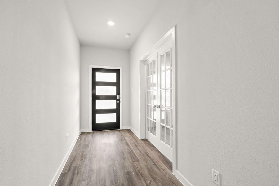 Spacious, unfurnished interior of a new home in Liberty Collection at Paloma at Sanford Farms, Waller (Image 16).