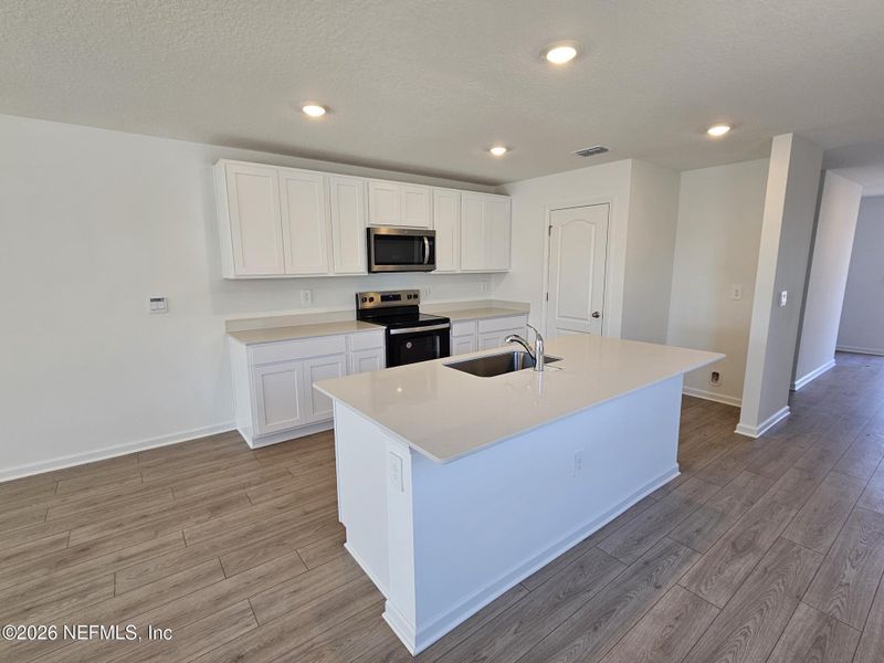 Furnished interior view inside a new home in Rookery, Green Cove Springs (Image 9).