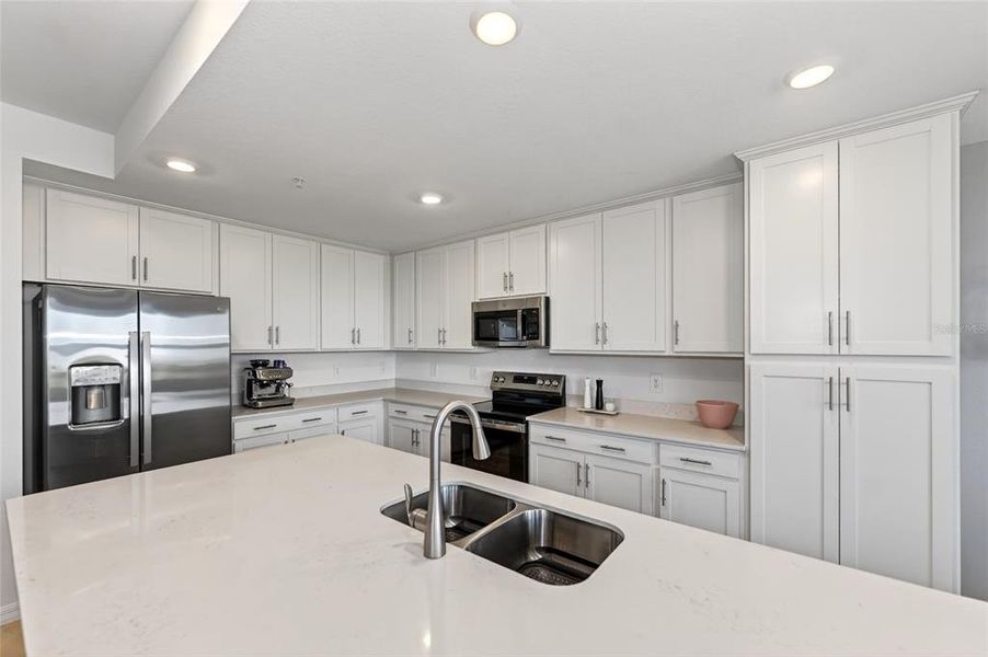 Furnished interior view inside a new home in Wellen Park Golf & Country Club, Venice (Image 30).