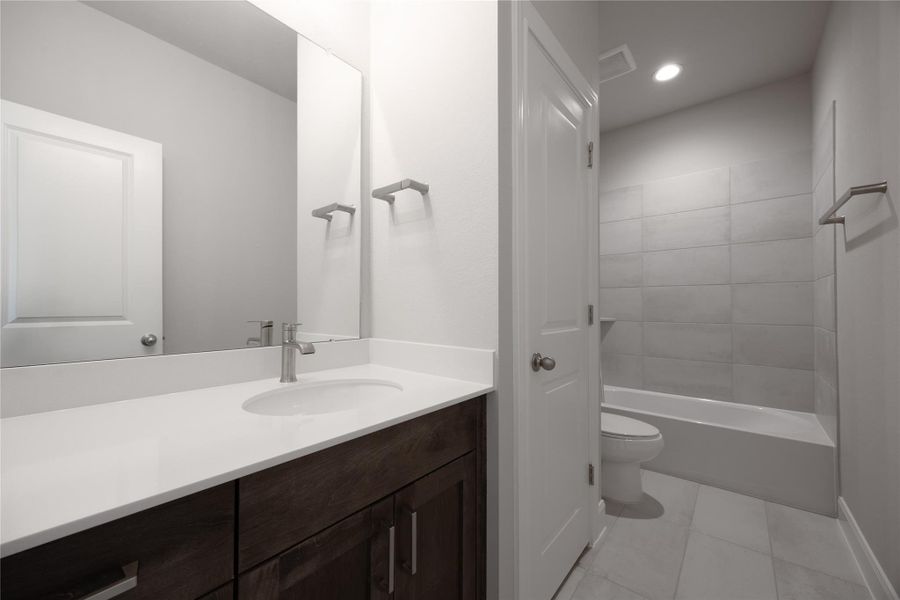 Furnished interior view inside a new home in Sunterra, Katy (Image 8). Furnished interior view inside a new home in Sunterra, Katy (Image 8).