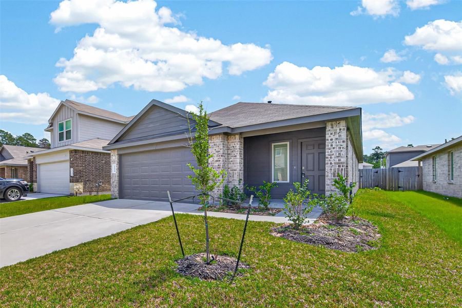 Front exterior of a new home in Breckenridge Forest, Spring, TX, highlighting curb appeal (Image 23).