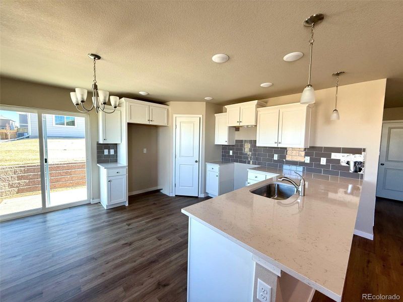 Furnished interior view inside a new home in , Watkins (Image 6). Furnished interior view inside a new home in , Watkins (Image 6).