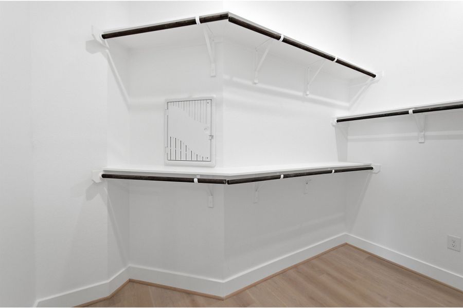 Spacious, unfurnished interior of a new home in Sunfield, Buda (Image 32). Spacious, unfurnished interior of a new home in Sunfield, Buda (Image 32).