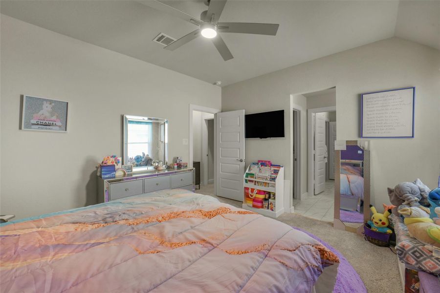 Generously sized secondary bedroom with abundant natural light.