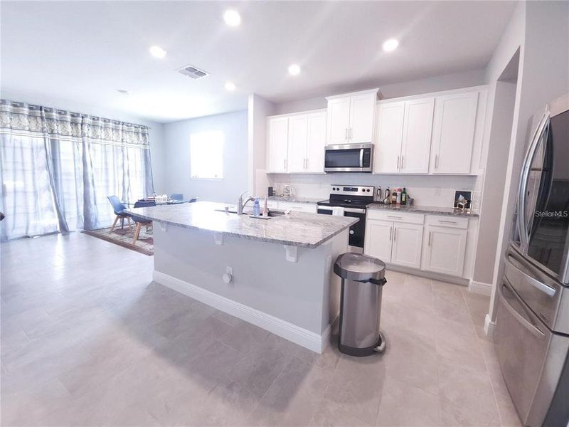Furnished interior view inside a new home in Woodcreek, Wesley Chapel (Image 12).