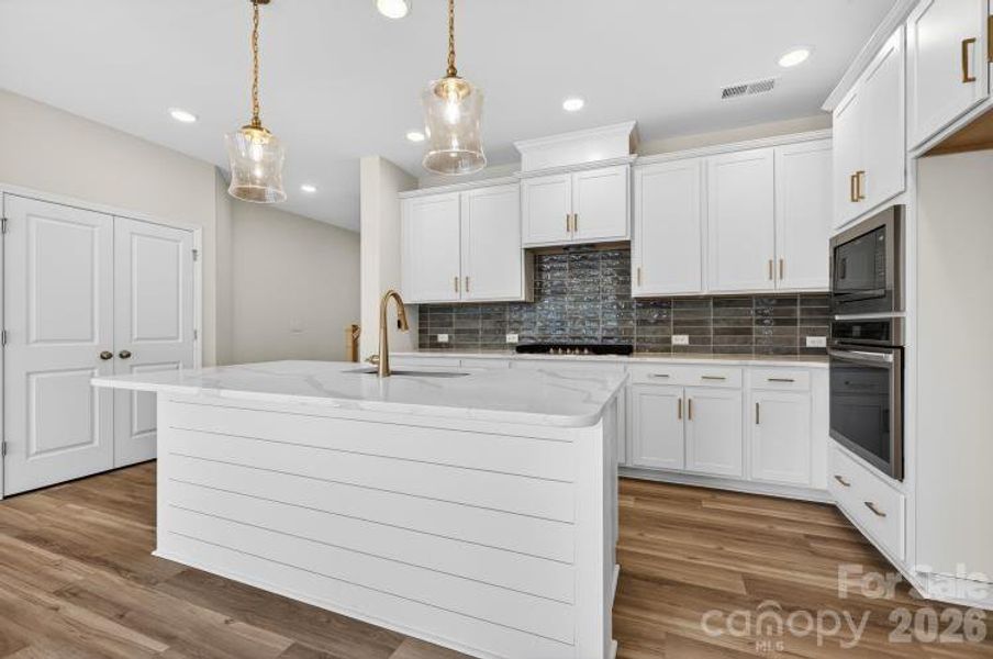 Furnished interior view inside a new home in North Creek Village - Townhomes, Huntersville (Image 9).