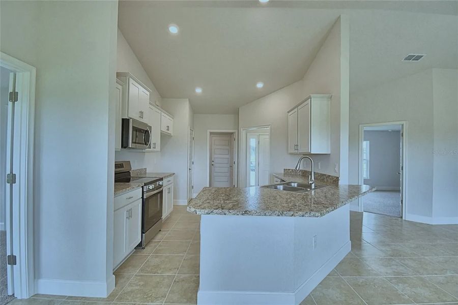 Furnished interior view inside a new home in Cadence Crossing, Auburndale (Image 7).