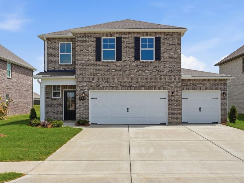 Representative exterior photo of a completed home built from the The Meadowbrook A by Davidson Homes LLC in Bailey Park, Fayetteville, TN (Image 26). Representative exterior photo of a completed home built from the The Meadowbrook A by Davidson Homes LLC in Bailey Park, Fayetteville, TN (Image 26).