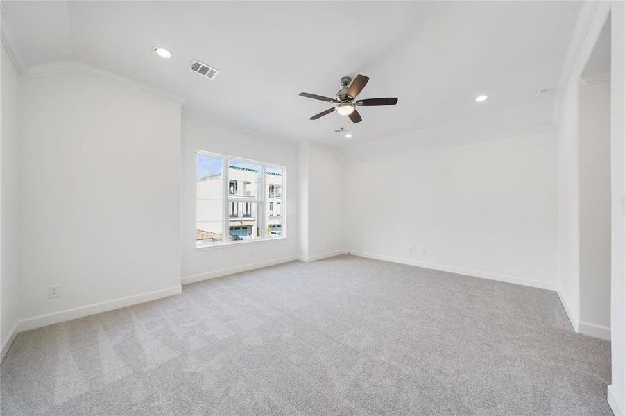 A spacious and well-lit Primary Bedroom with access to a luxurious bathroom and large closet. (Sample photos of a completed Chesapeake floor plan. The image may feature alternative selections and/or upgrades.)