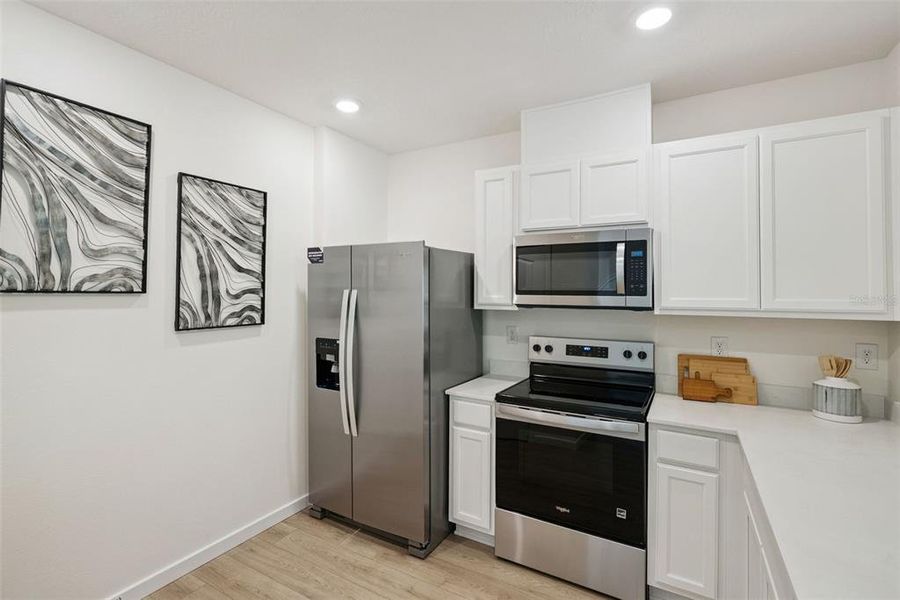 Furnished interior view inside a new home in Oak Pointe, Apopka (Image 11). Furnished interior view inside a new home in Oak Pointe, Apopka (Image 11).