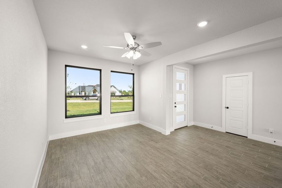 Front exterior of a new home in Carrera Ranch, Waxahachie, TX, highlighting curb appeal (Image 5).