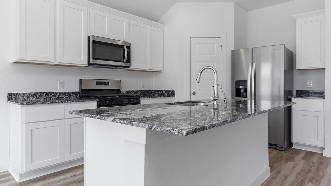 Furnished interior view inside a new home in Caldwell Crossing, Iowa Colony (Image 4). Furnished interior view inside a new home in Caldwell Crossing, Iowa Colony (Image 4).