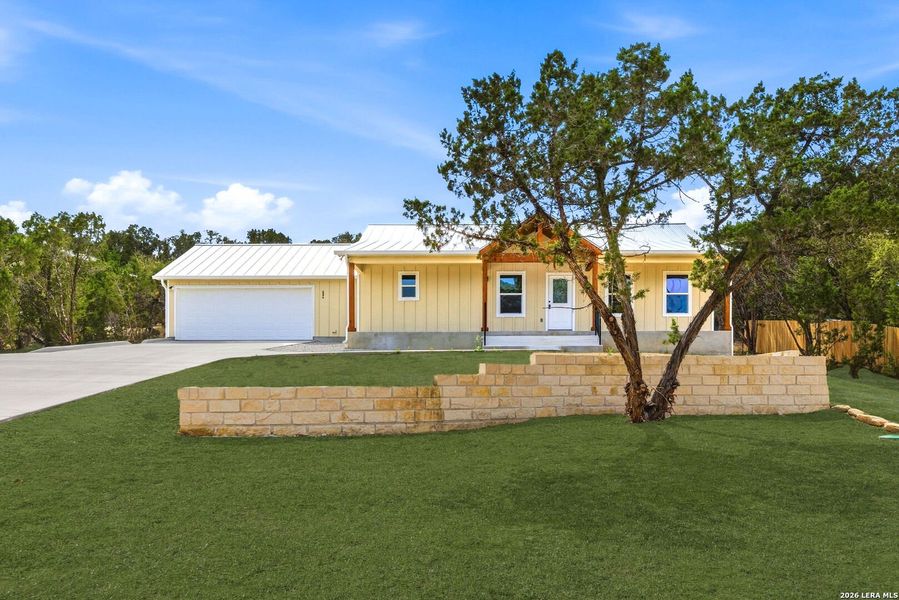 Front exterior of a new home in , Fischer, TX, highlighting curb appeal (Image 27).