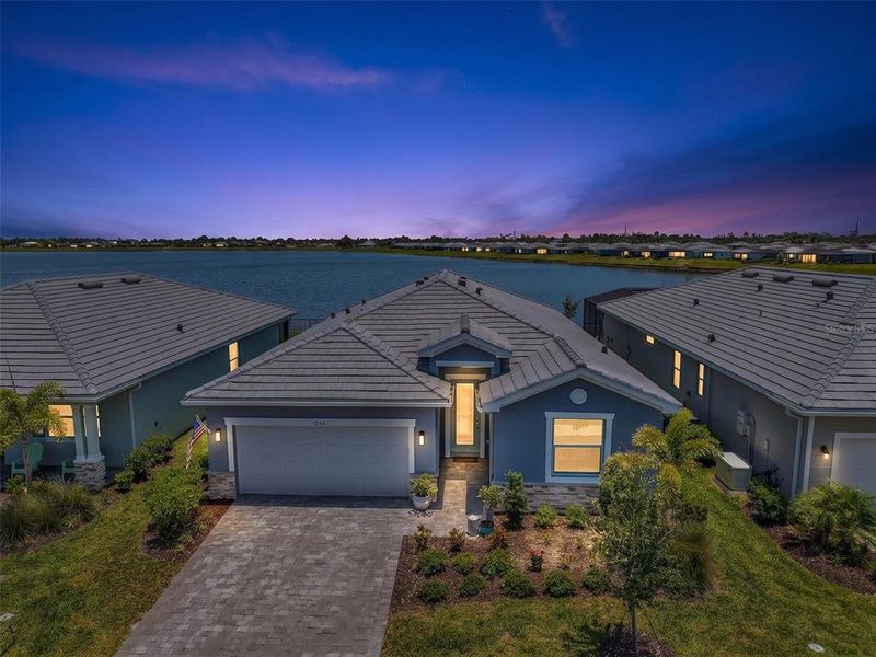 Front exterior of a new home in , Englewood, FL, highlighting curb appeal (Image 21).
