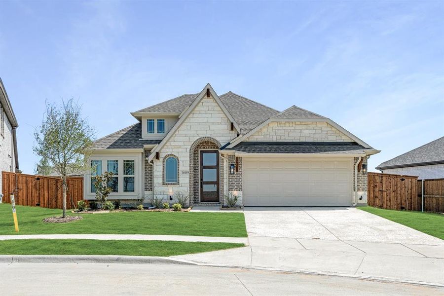 Front exterior of a new home in Willow Wood Classic 50, McKinney, TX, highlighting curb appeal (Image 26). Front exterior of a new home in Willow Wood Classic 50, McKinney, TX, highlighting curb appeal (Image 26).
