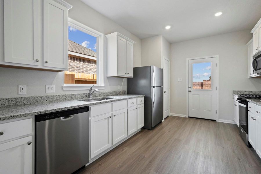 Furnished interior view inside a new home in Vacek Country Meadows, Richmond (Image 4). Furnished interior view inside a new home in Vacek Country Meadows, Richmond (Image 4).