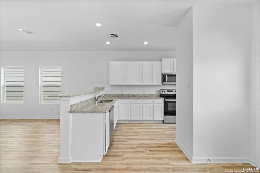 Furnished interior view inside a new home in Blue Wing, San Antonio (Image 9). Furnished interior view inside a new home in Blue Wing, San Antonio (Image 9).