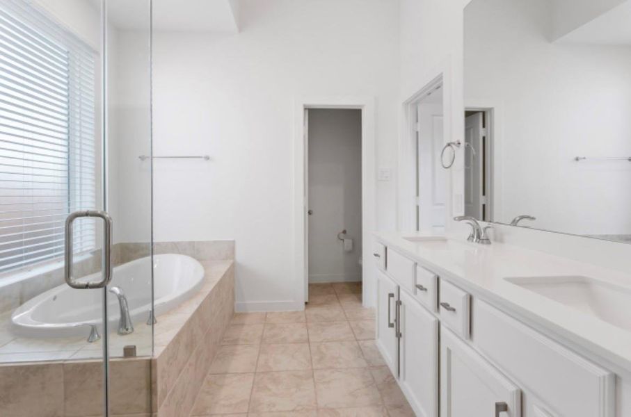 Master bath boasts a dual sink vanity perfect for busy mornings. Master bath boasts a dual sink vanity perfect for busy mornings.