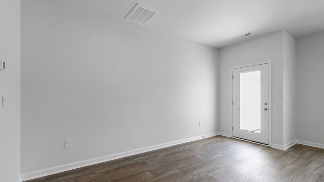 Spacious, unfurnished interior of a new home in The Townes at Bexford, Willow Spring (Image 9).