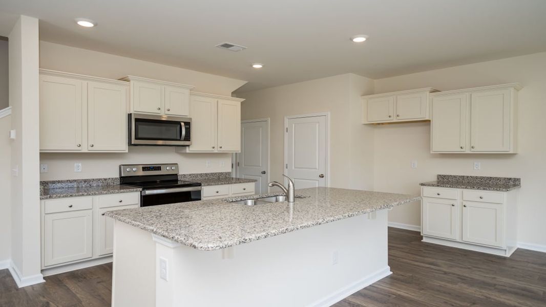 Furnished interior view inside a new home in The Pines at Blake Farm, Wilmington (Image 5).
