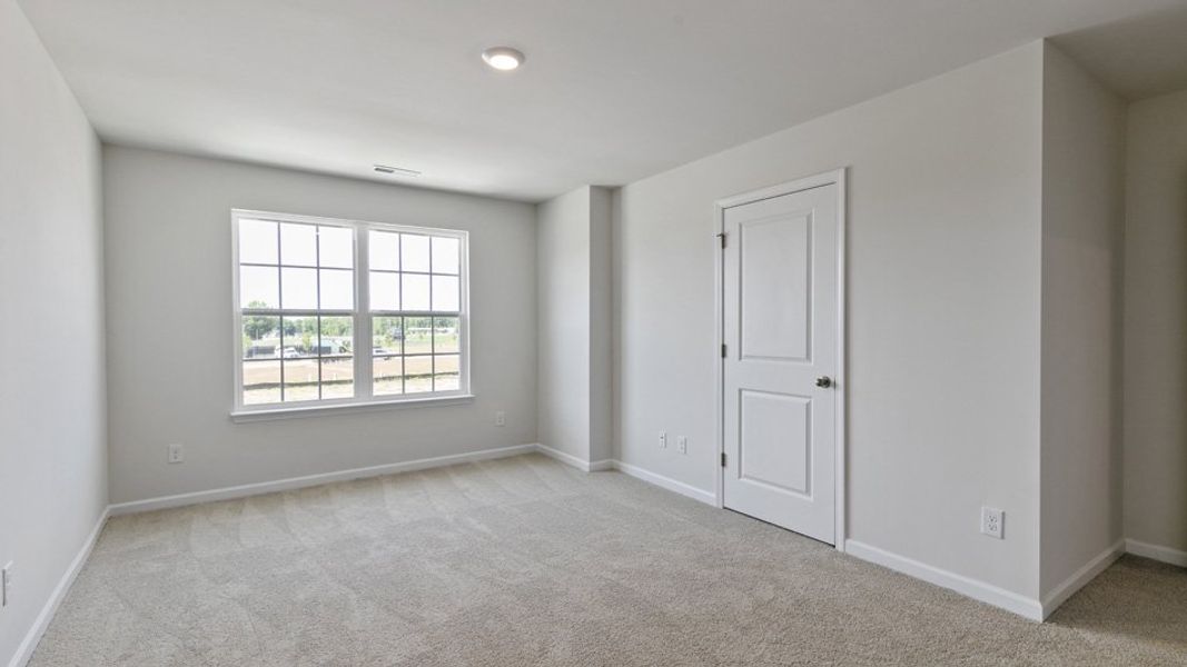 Spacious, unfurnished interior of a new home in The Townes at Wilson's Ridge, Smithfield (Image 16).