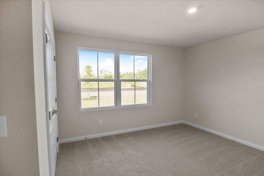 Spacious, unfurnished interior of a new home in Bronson Ridge, Greenwood (Image 10).