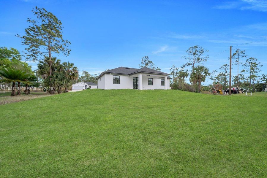 Exterior details and patio area of a home in , Lehigh Acres (Image 22).
