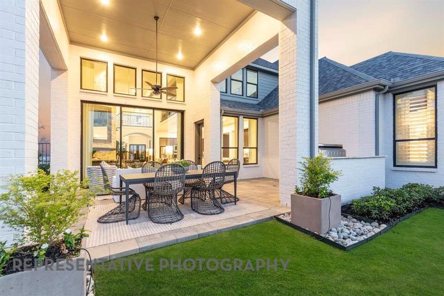 Exterior details and patio area of a home in Pecan Square, Northlake (Image 21).