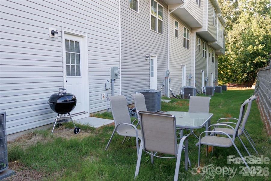 Exterior details and patio area of a home in , Charlotte (Image 3).