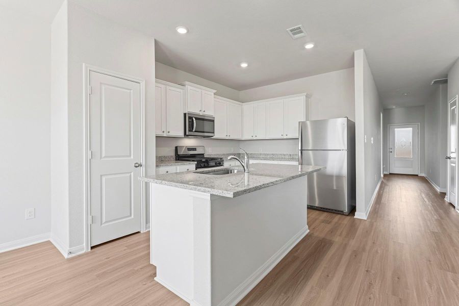Furnished interior view inside a new home in Emberly, Beasley (Image 7).